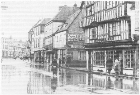 Church Street/St. Mary 's Lane.<br>Cyclist is Mr. Sprackling, with fire engine near<br>the Crescent, pumping water from cellars. 