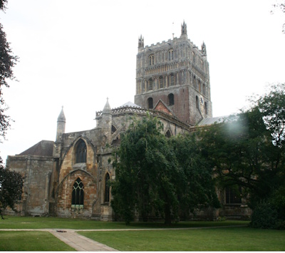 Photograph of the exterior of the Chancel showing<br>where the former Lady Chapel was demolished.<br>Today its outline has been marked in the grass.